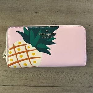 Pink Kate Spade pineapple wallet